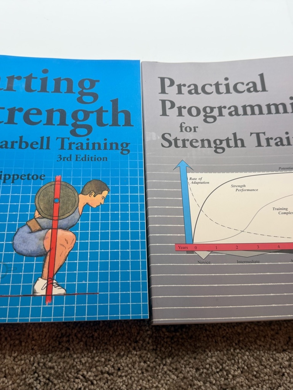 Starting Strength and Practical Programming by Mark Rippetoe